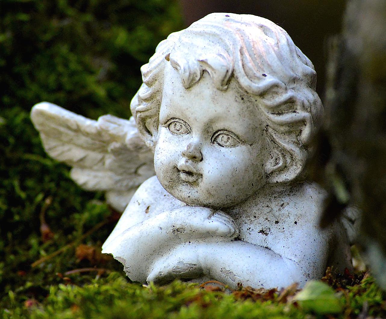 小天使石像图片民族工艺品