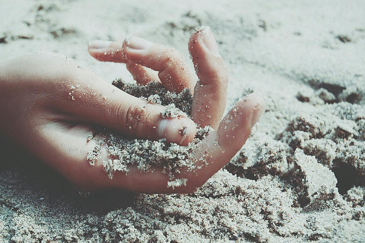 手握沙子图片高清摄影