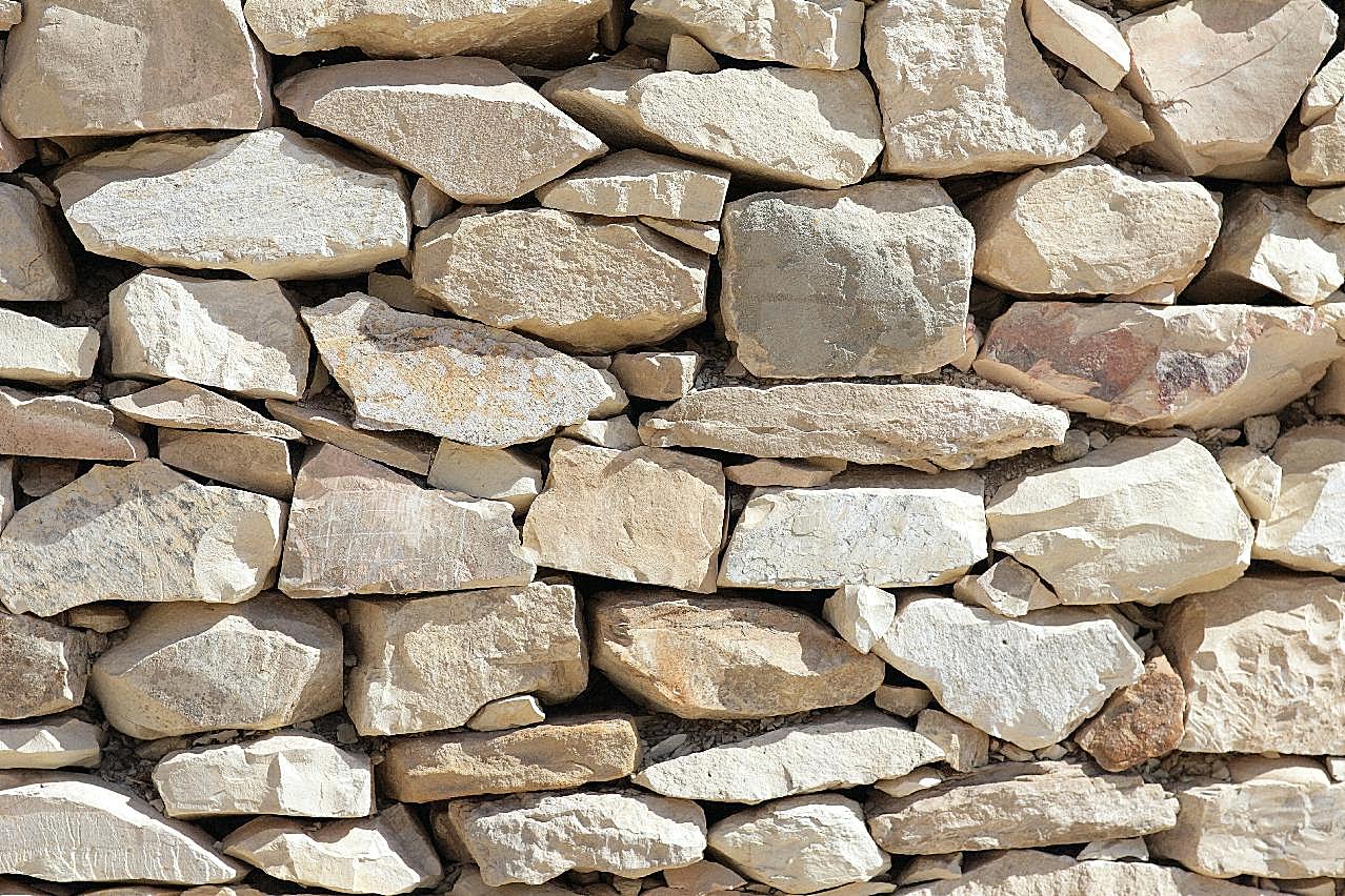 石头堆砌成的石墙摄影高清