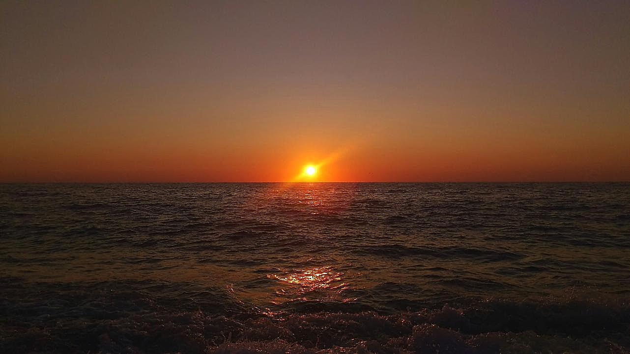 爱奥尼亚海日落美景图片黄昏